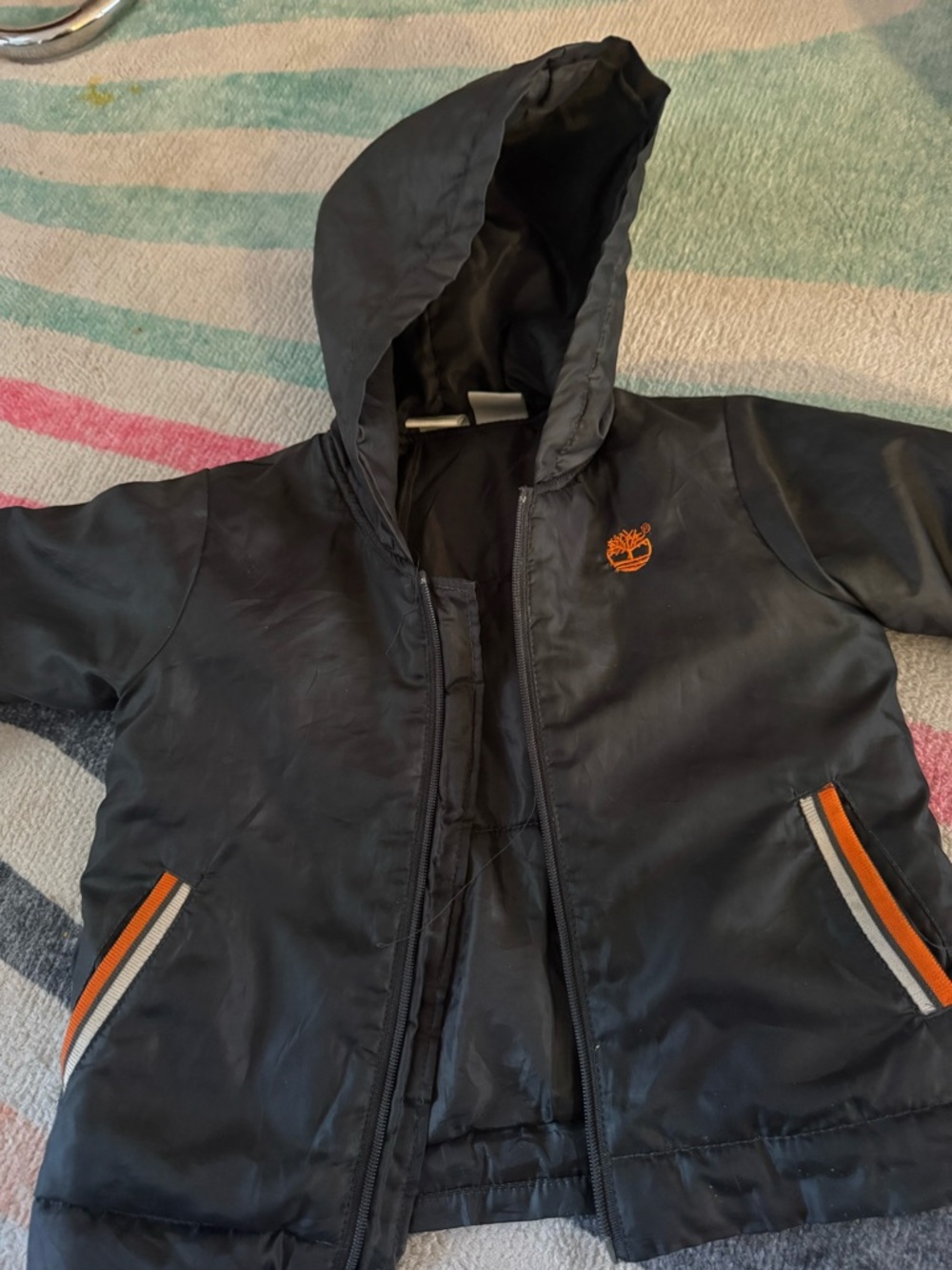 Timberland Black Hooded Puffer Jacket with Orange Accents